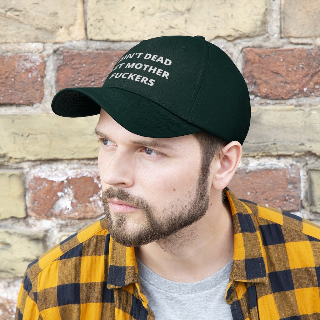 Unisex AIN'T DEAD YET MOTHER FUCKERS Twill Hat